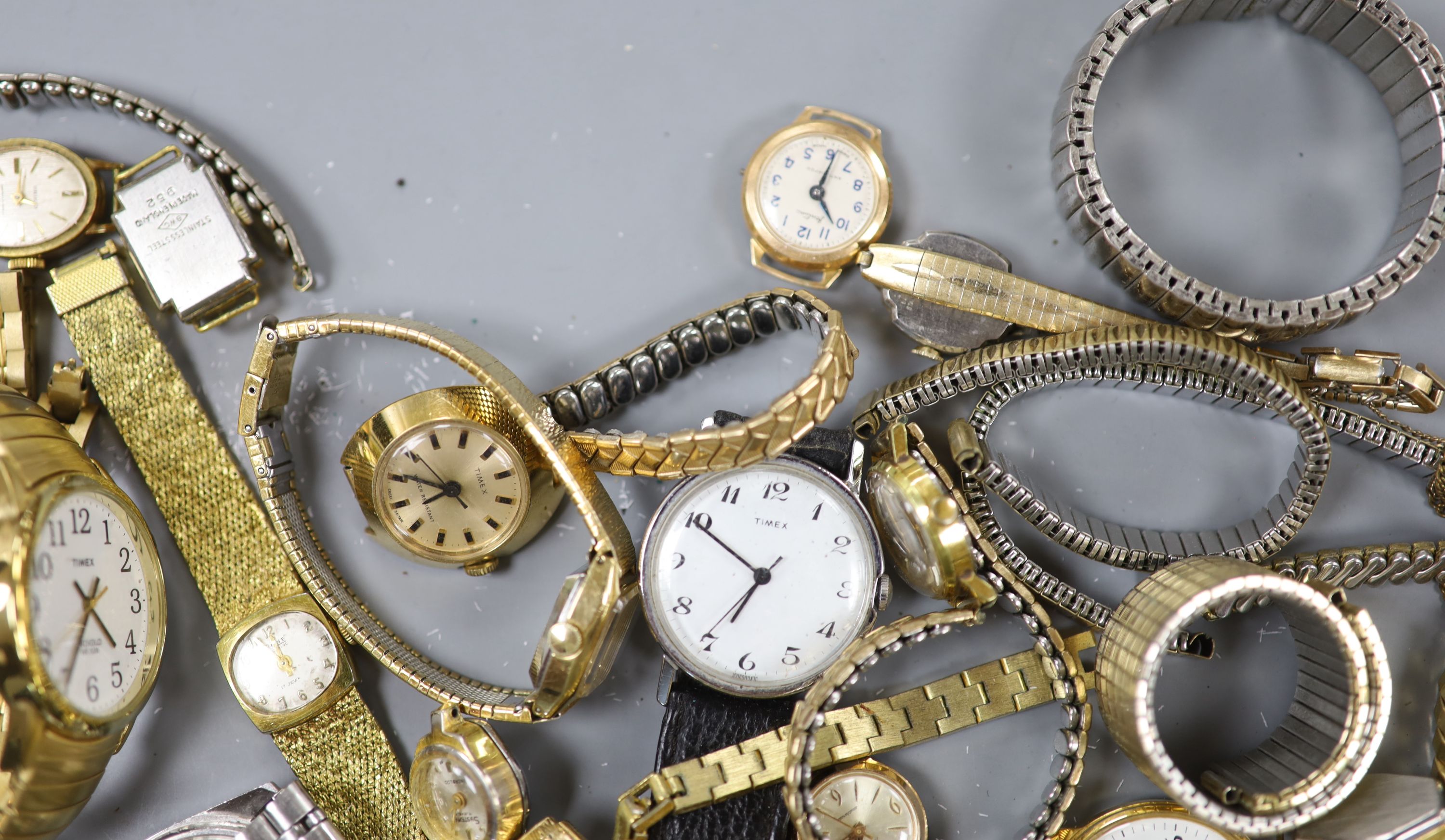 A collection of assorted lady's and gentleman's wristwatches including Timex, Accurist and Seiko.
